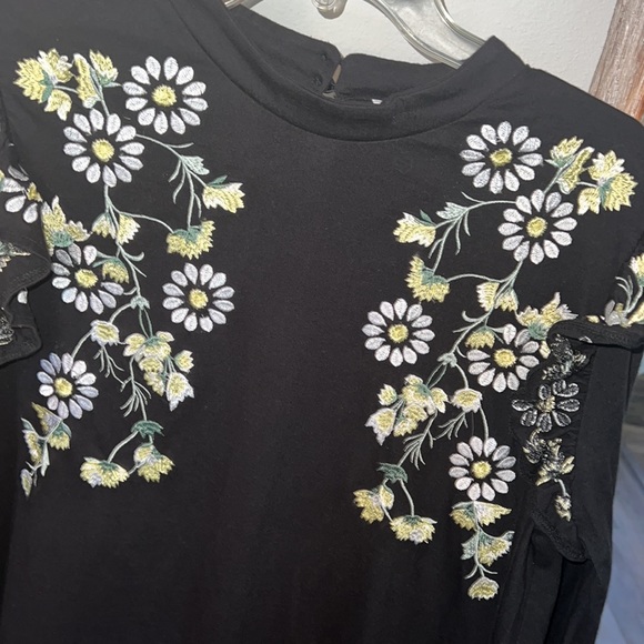 ASOS DESIGN mini swing dress with shoulder ruffle and daisy embroidery black 8 - Picture 2 of 8